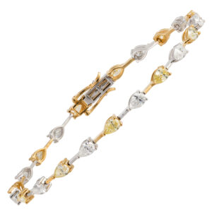 Pulseira em ouro amarelo e branco com diamantes.