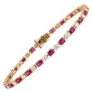 Pulseira em ouro amarelo com rubis e diamantes.