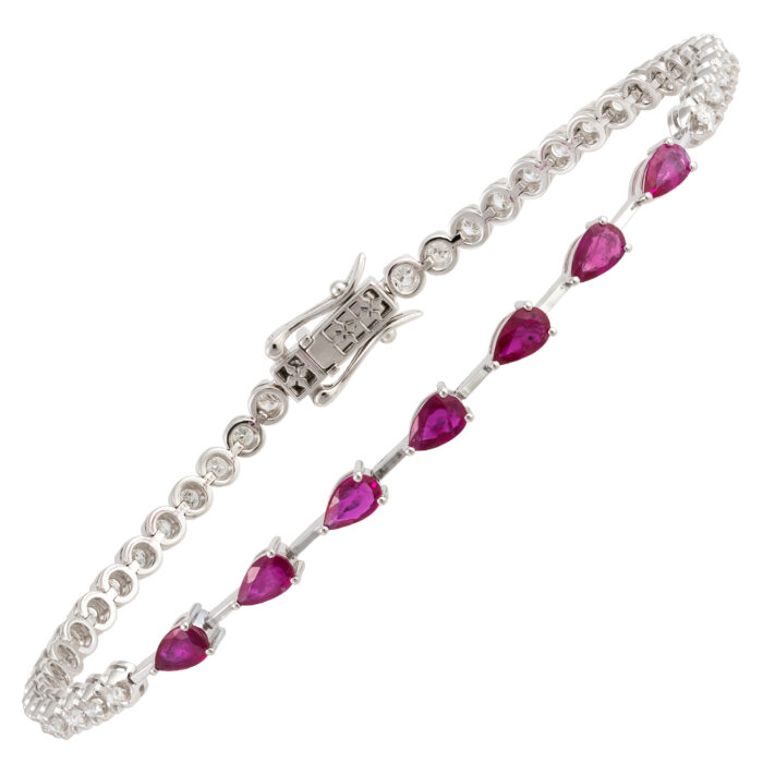 Pulseira em ouro branco com rubis e diamantes.